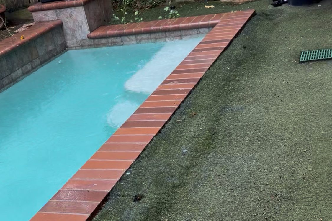 Poolside worn turf before replacement