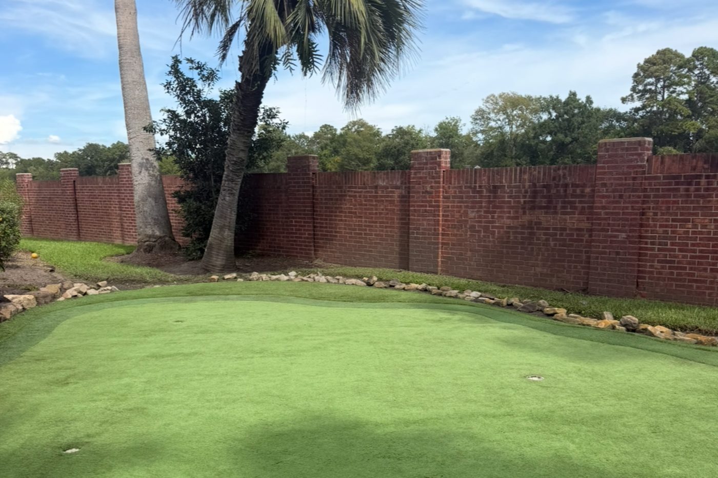 Putting green after moss and weed removal